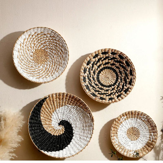 Set of four handmade seagrass wall baskets in natural tones, perfect for boho and Scandinavian home decor.