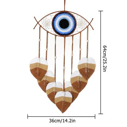 Handmade dream catcher featuring circular rope design and soft cotton threads for serene decoration.