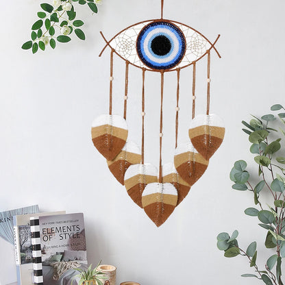 DreamWeave handwoven dream catcher made of natural cotton, adding bohemian elegance to modern interiors.