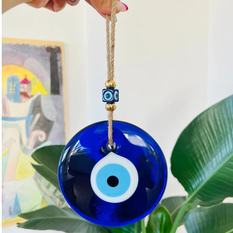 Traditional Greek evil eye charm in deep blue glass — brings peace and positive energy to your home.