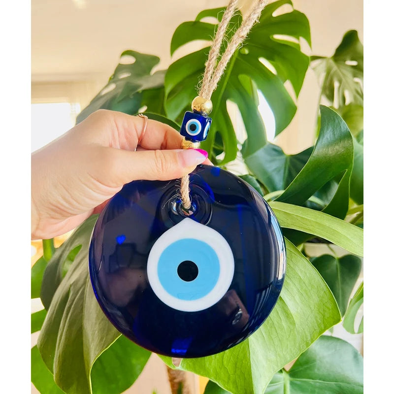 Blue evil eye wall pendant — stylish and meaningful home decoration symbolising protection and balance.