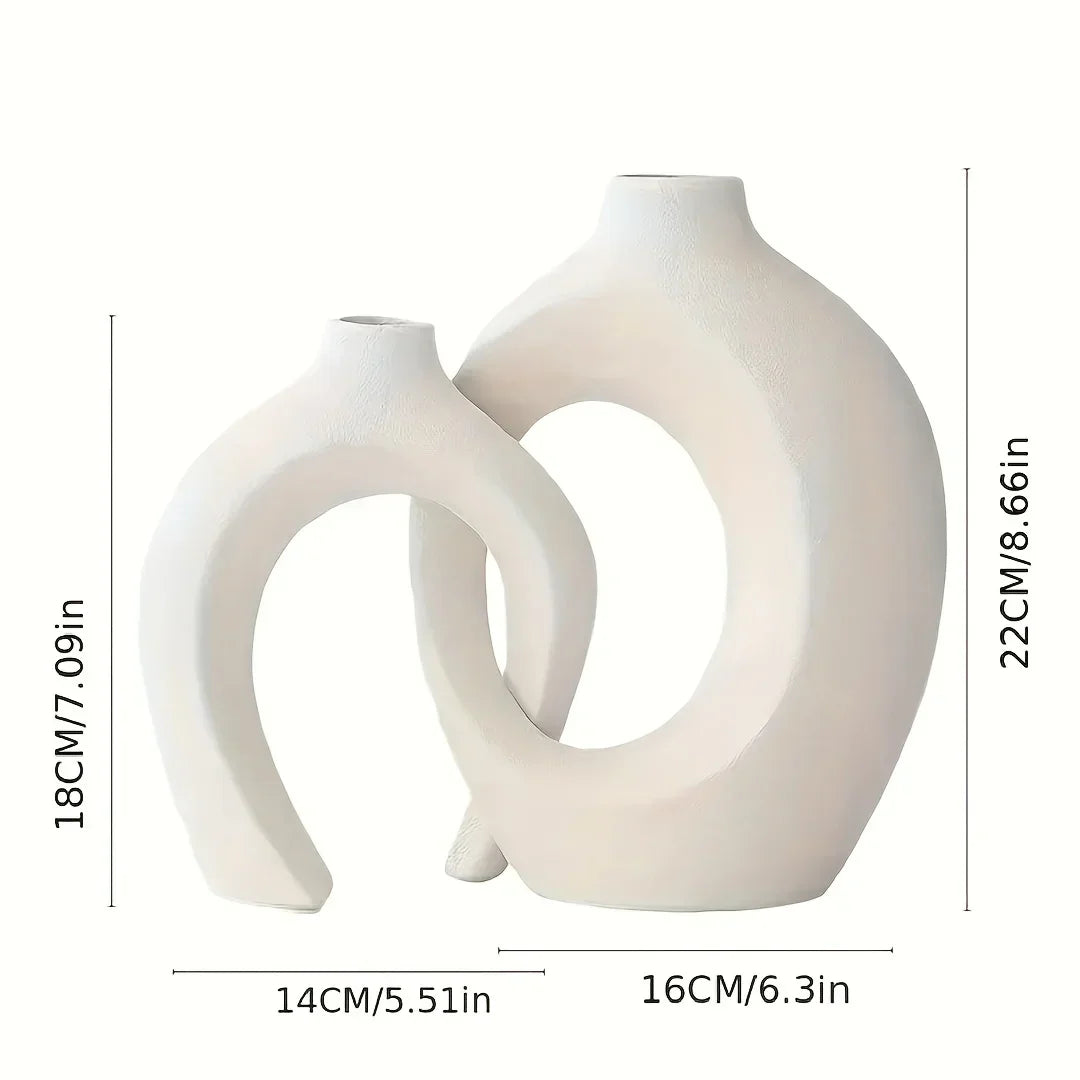 Two white ceramic vases with dimensions displayed on a white background