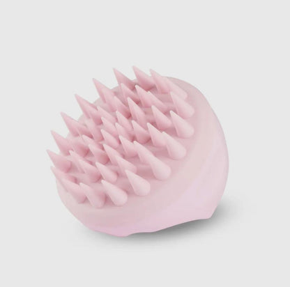 Silicone shampoo massage brush with soft bristles for gentle scalp stimulation

